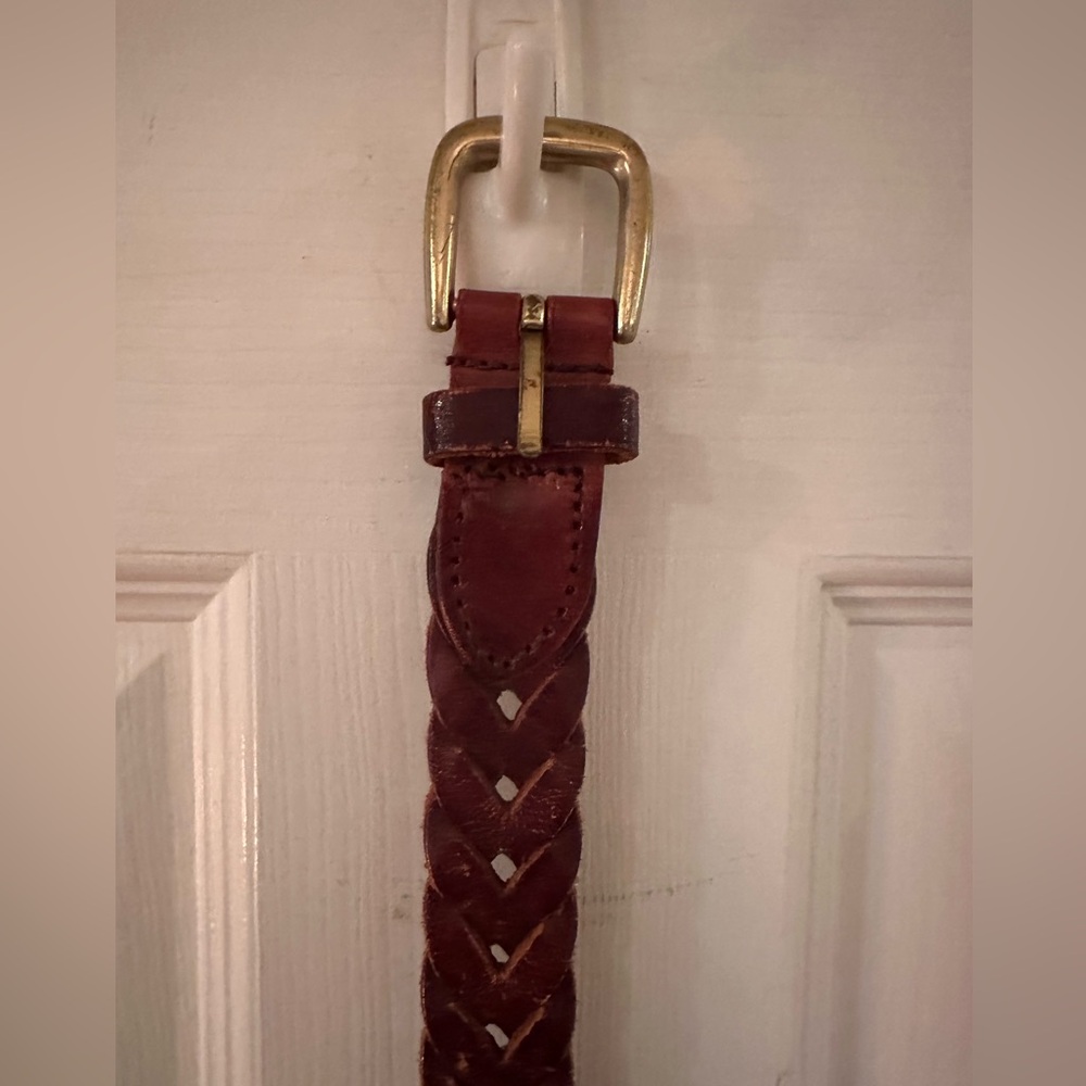 Leather belt with solid brass buckle. 34”. Great condition